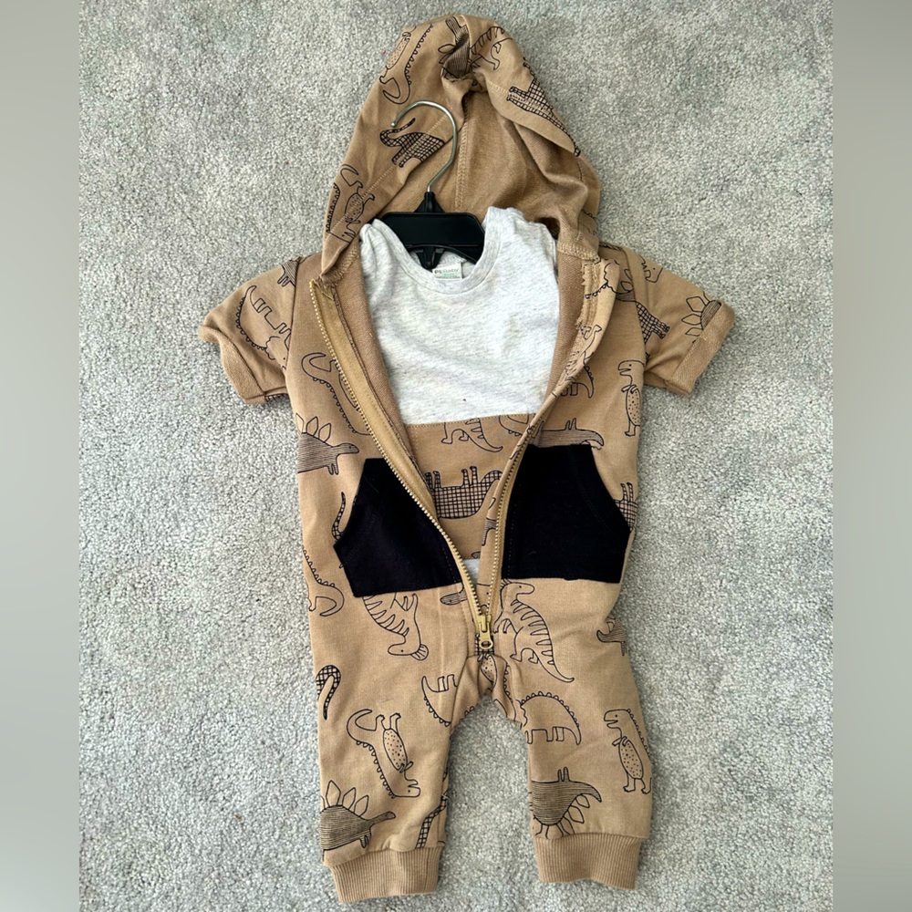 Brand new never worn PL Baby onesie and bodysuit